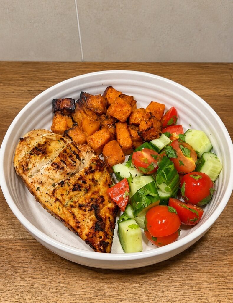 Seasoned Chicken Bowl with Sweet Potato and Cucumber Tomato Salad